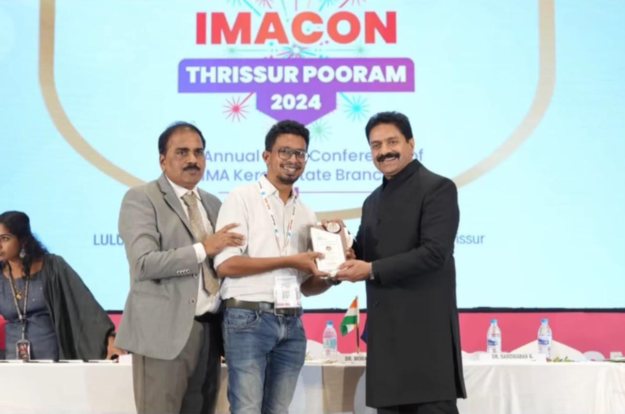Doctor receiving an award at IMACON Thrissur Pooram 2024